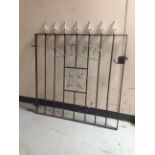 A painted wrought metal "NUFC" gate,