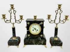 A 19th century French green marble and gilt metal clock garniture, striking on a bell,