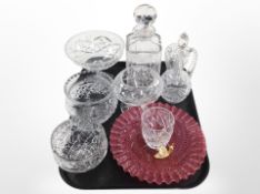 A cranberry glass swirl pedestal dish with ribbed edge,