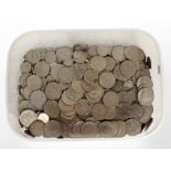 A large quantity of British pre-decimal and other coins, half crowns, etc.