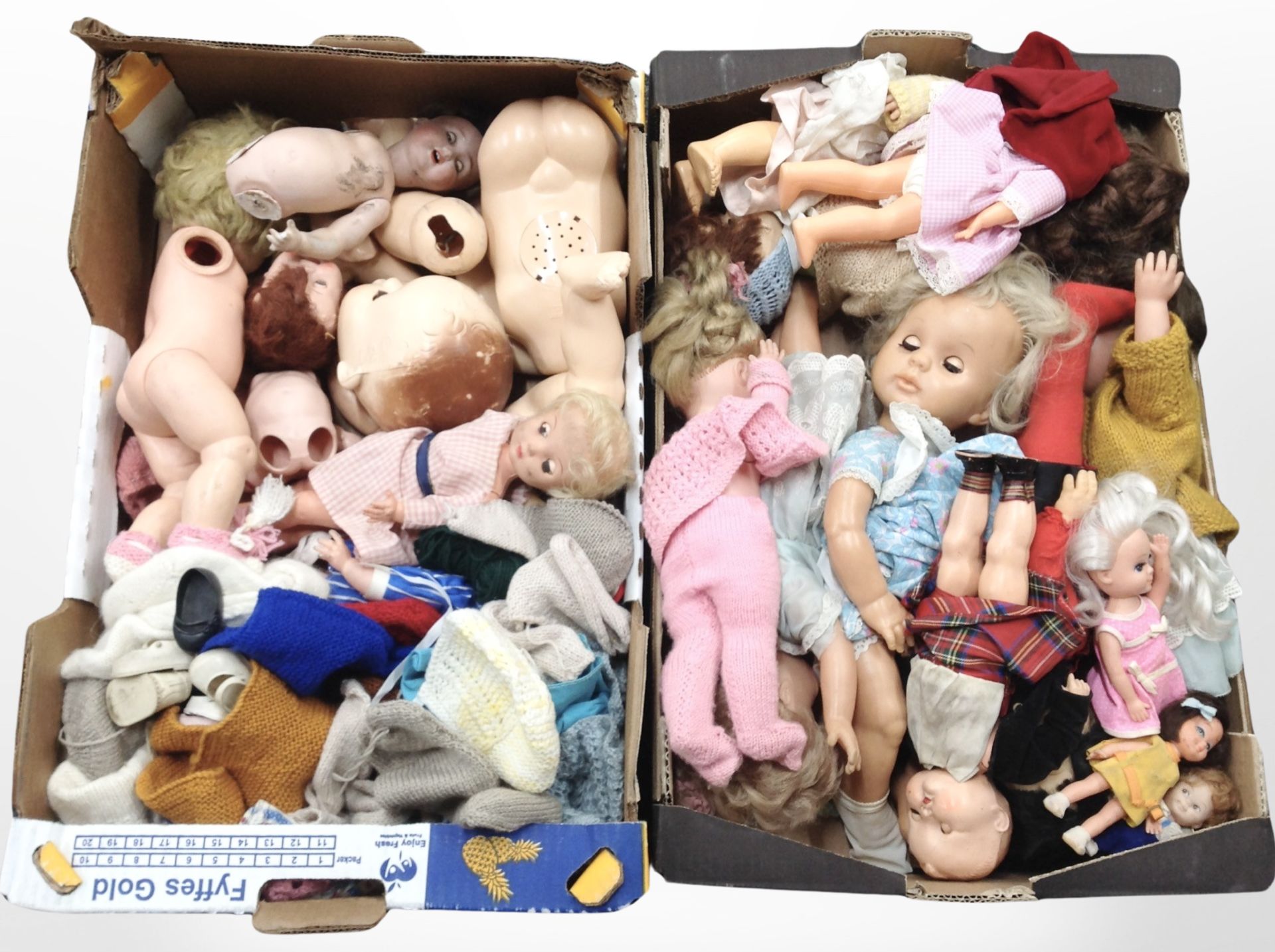 Two boxes of antique and modern dolls and doll's clothing