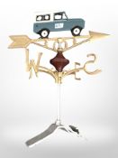 A cast-iron Land Rover weather vane.