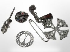 A group of Celtic/Scottish brooches and a pendant.