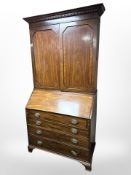 A George III mahogany and satinwood inlaid bureau bookcase,