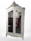 A French style painted mirrored double door armoire,