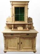 An early 20th century Danish pine and leaded glass sideboard,