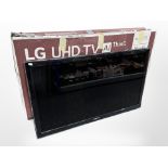 An LG 50 inch LCD TV with in box with lead and remote