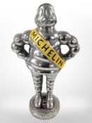 A cast-aluminium Michelin Man figure, height 37cm.