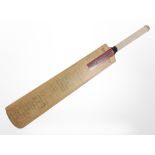 A Gray-Nicolls cricket bat bearing many signatures including Essex County Cricket Club and