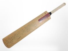 A Gray-Nicolls cricket bat bearing many signatures including Essex County Cricket Club and