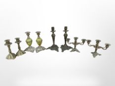 Four pairs of brass and other candlesticks, tallest 24cm.