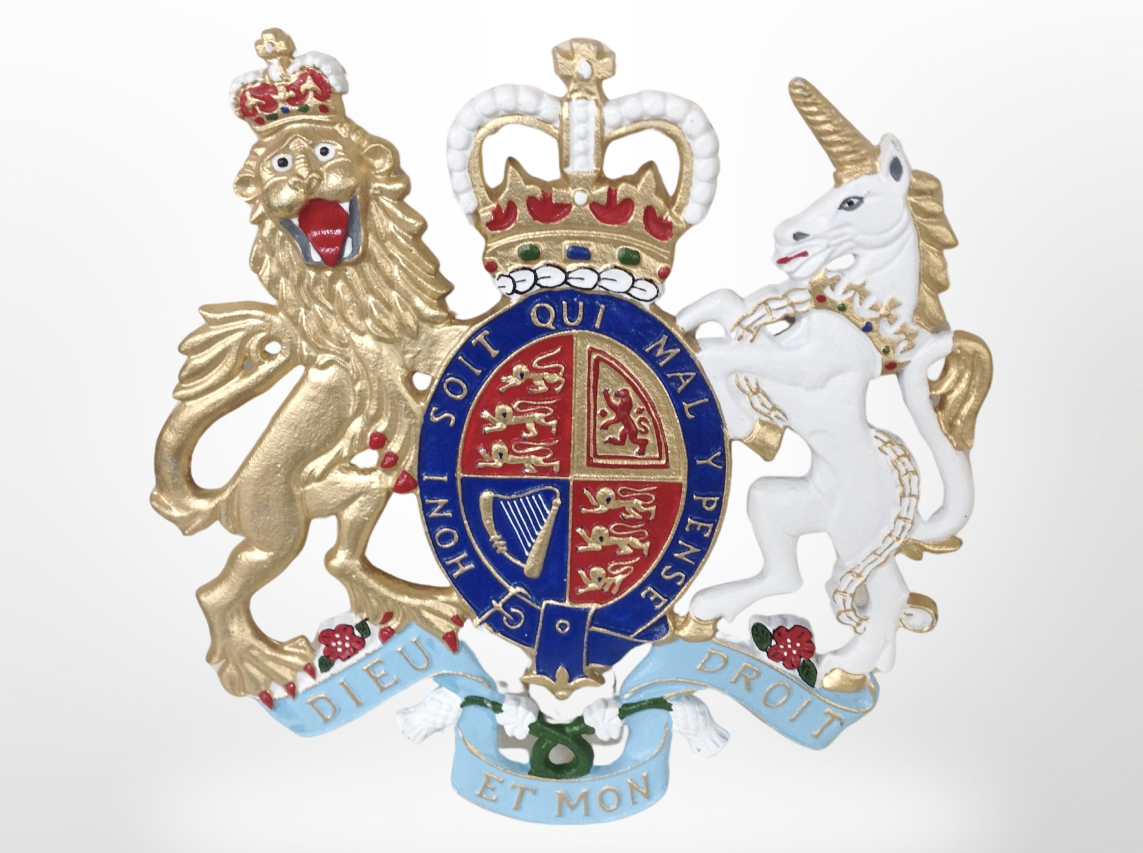 A painted cast iron British Royal Coat of Arms,