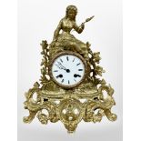 A 19th century French gilt metal figural mantel clock, movement lacking bell, with pendulum and key,