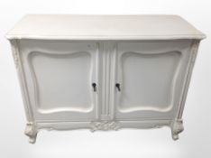 A French style painted double door sideboard,