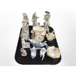 A group of continental bisque porcelain figures,