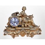 A 19th century French gilt metal figural mantel clock, striking on a bell, with pendulum and key,