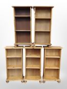 Five contemporary pine open bookshelves,