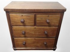 A Victorian mahogany four drawer chest,