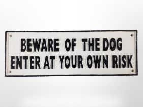 A cast-iron 'Beware of the dog' sign, width 39.5cm.