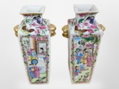 A pair of late 19th-century Canton porcelain square-section baluster vases with gilt handles,