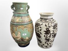 Two Eastern earthenware vases, tallest 54cm.