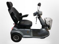 A Karma mobility scooter with key and charger