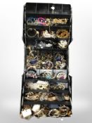 A concertina storage box containing a large quantity of costume bead bangles, bracelets, necklaces,
