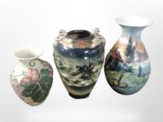 A Japanese export earthenware vase and two further continental vases, tallest 31cm.
