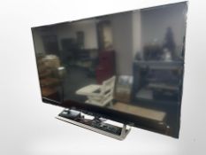 A Samsung 48-inch LCD TV with remote and lead (continental plug).