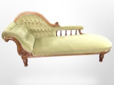 A Victorian carved walnut chaise longue,