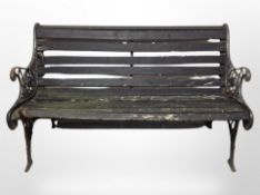 A cast iron framed garden bench,