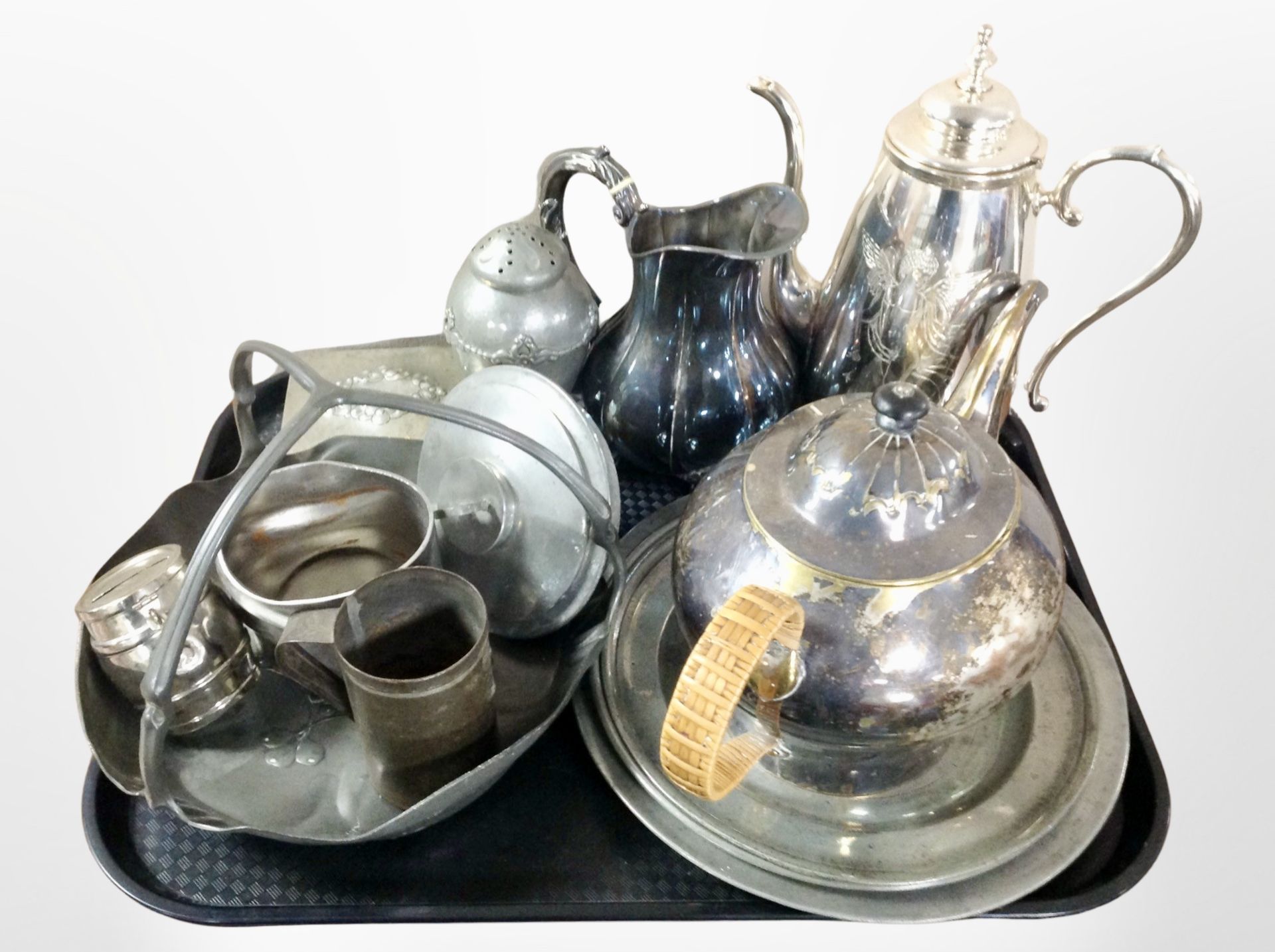 A group of 19th and 20th-century silver-plated and pewter wares, including teapots, sifter,