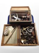 A group of bottle stoppers, brass tap, small cast figures, vintage corkscrew, etc.