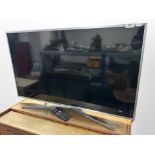 A Samsung 40-inch LCD TV with remote and lead (continental plug).