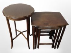 An Edwardian mahogany and satinwood inlaid table together with a nest of three oak tables