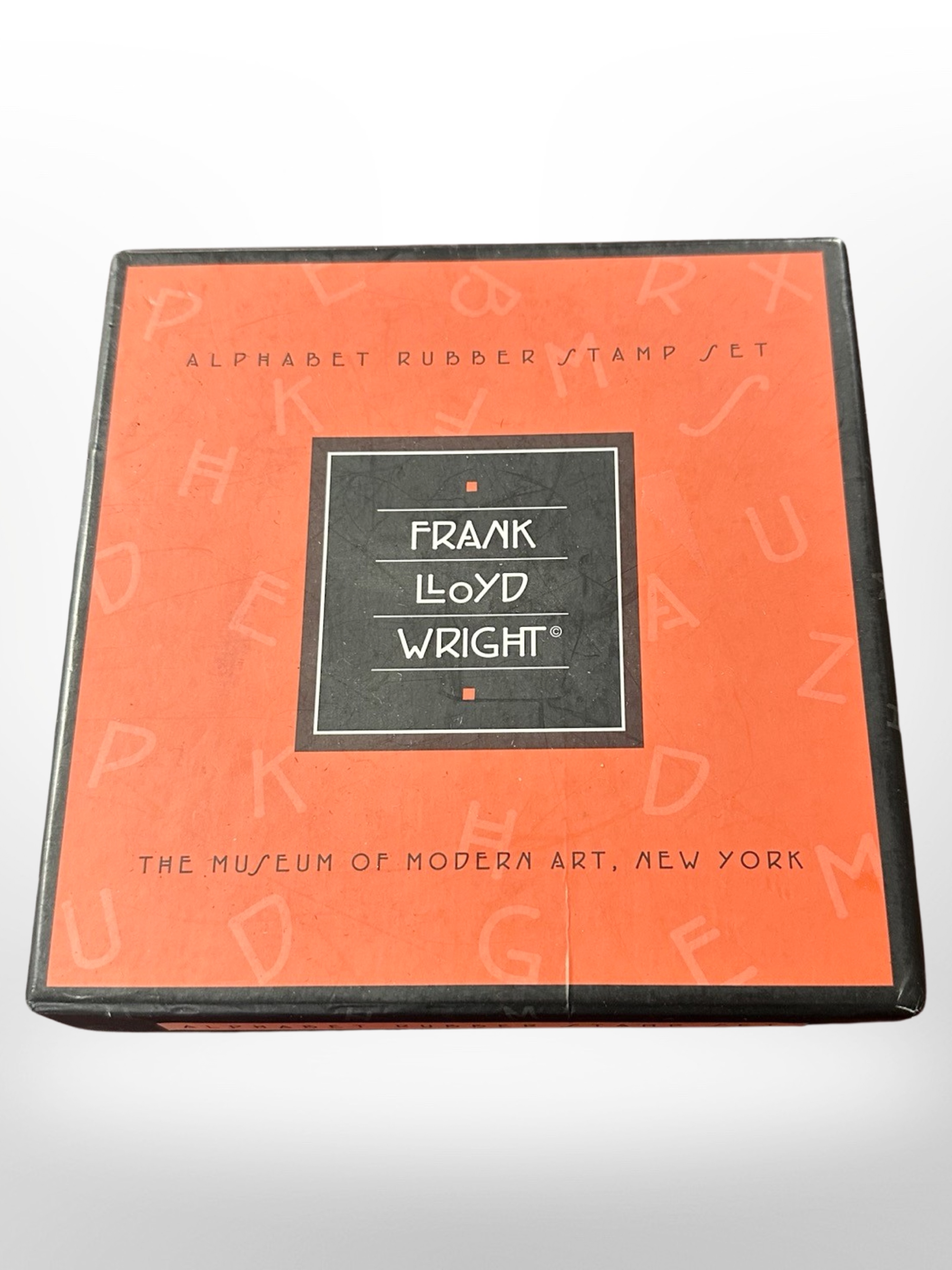 A Frank Lloyd Wright alphabet rubber stamp set from the Museum of Modern Art, New York.