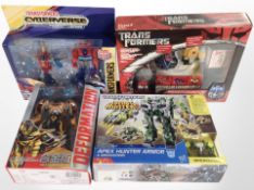 Two Hasbro Transformers figurine box sets, plus a Basic Fun Transformers set,