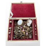 A jewellery box of gold plated jewellery, dress rings, torque bangles, cameo brooch,