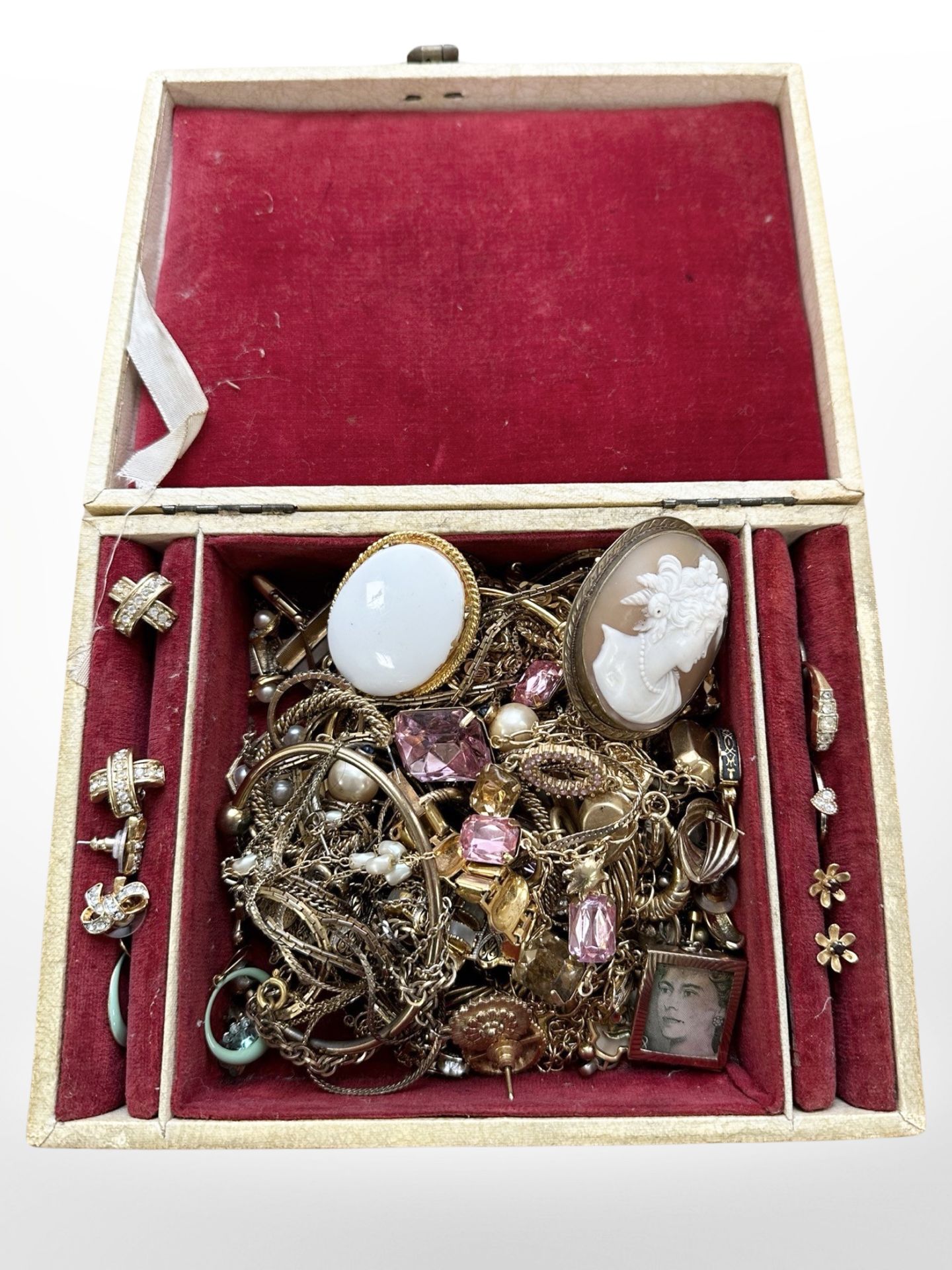 A jewellery box of gold plated jewellery, dress rings, torque bangles, cameo brooch,