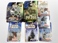 Seven Hasbro and Kenner Star Wars figurines, boxed.