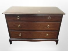 A Stag three drawer chest,