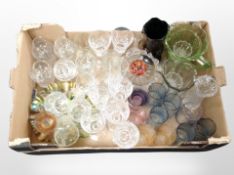 A box of glass wares including petrol glass bowl, assorted drinking glasses, paperweight, etc.