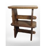 A pair of oak refectory stools,