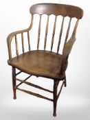 A 19th century elm spindle back armchair,