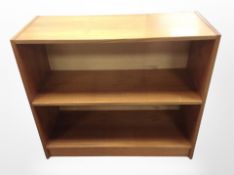 A Danish teak and MDF open low bookcase,