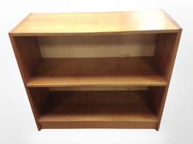 A Danish teak and MDF open low bookcase,