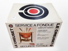 A Le Creuset fondue set in box.