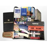 A group of quiz books, trivia games, other games including Solitaire, Cribbage,