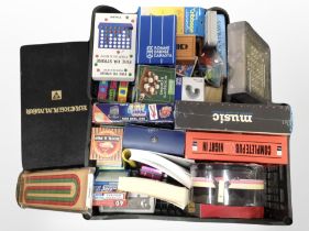 A group of quiz books, trivia games, other games including Solitaire, Cribbage,