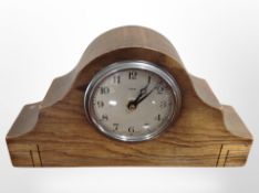An Enfield oak-cased mantel clock, height 16cm.